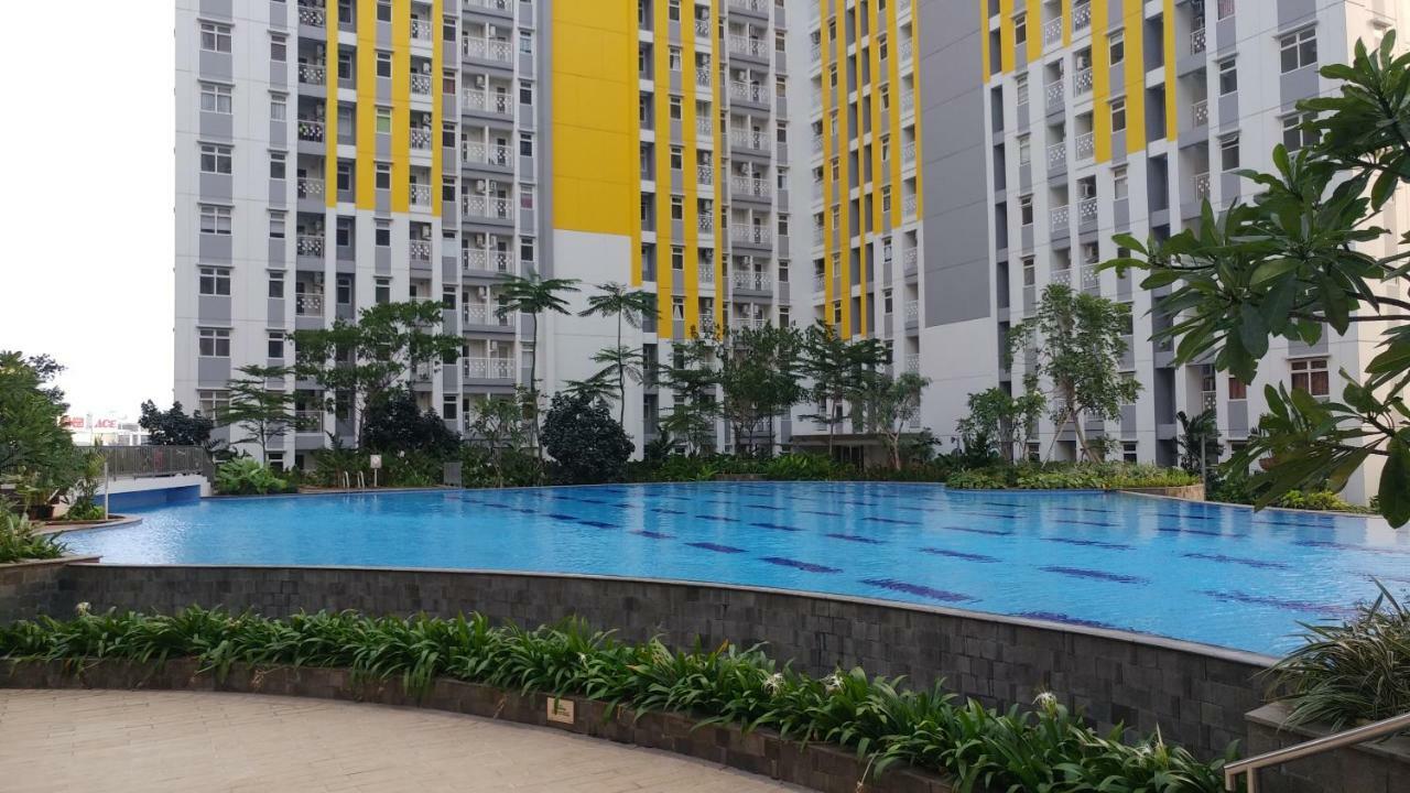 Modern And Bright 2br Springlake By Travelio * Bekasi
